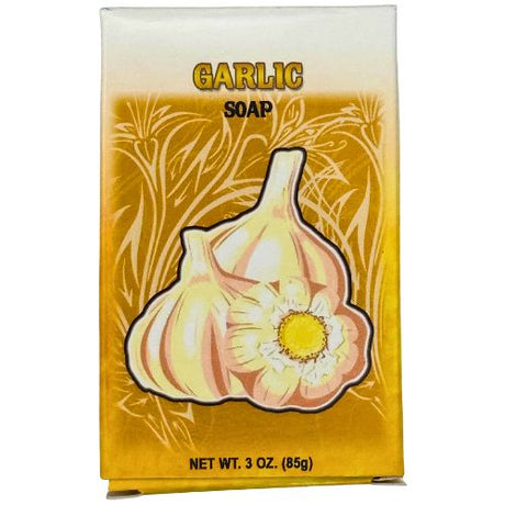 Garlic soap packaging with garlic bulb and flower illustration on a yellow background