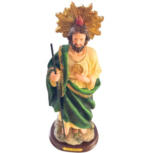 Statue of Saint Jude a religious figure in green robe with gold accents on a white background