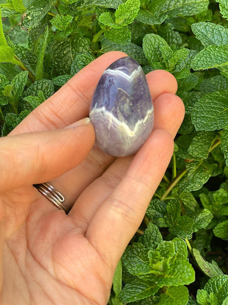 Undrilled yoni egg made of chevron amethyst