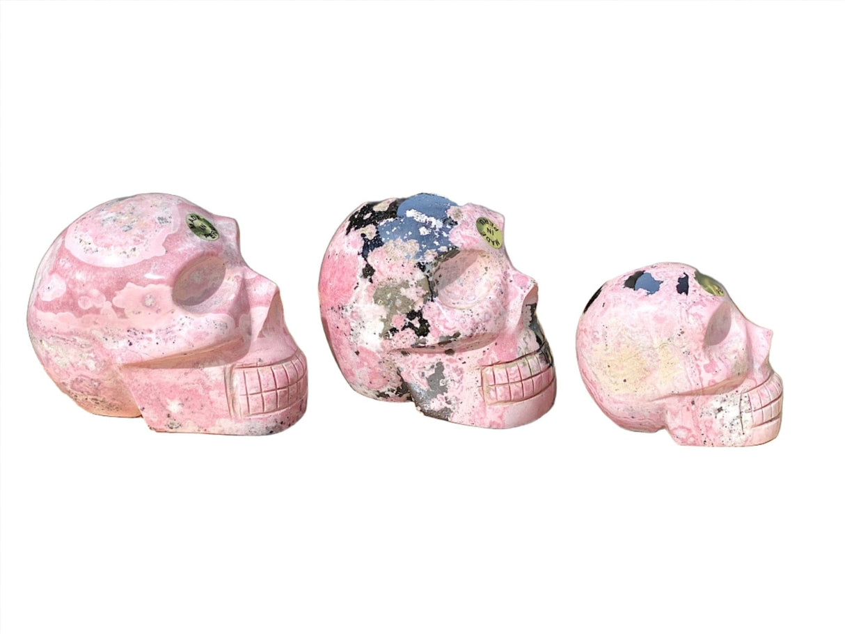 Hand Carved Peruvian Rhodonite Skulls - Shop Cosmic Healing