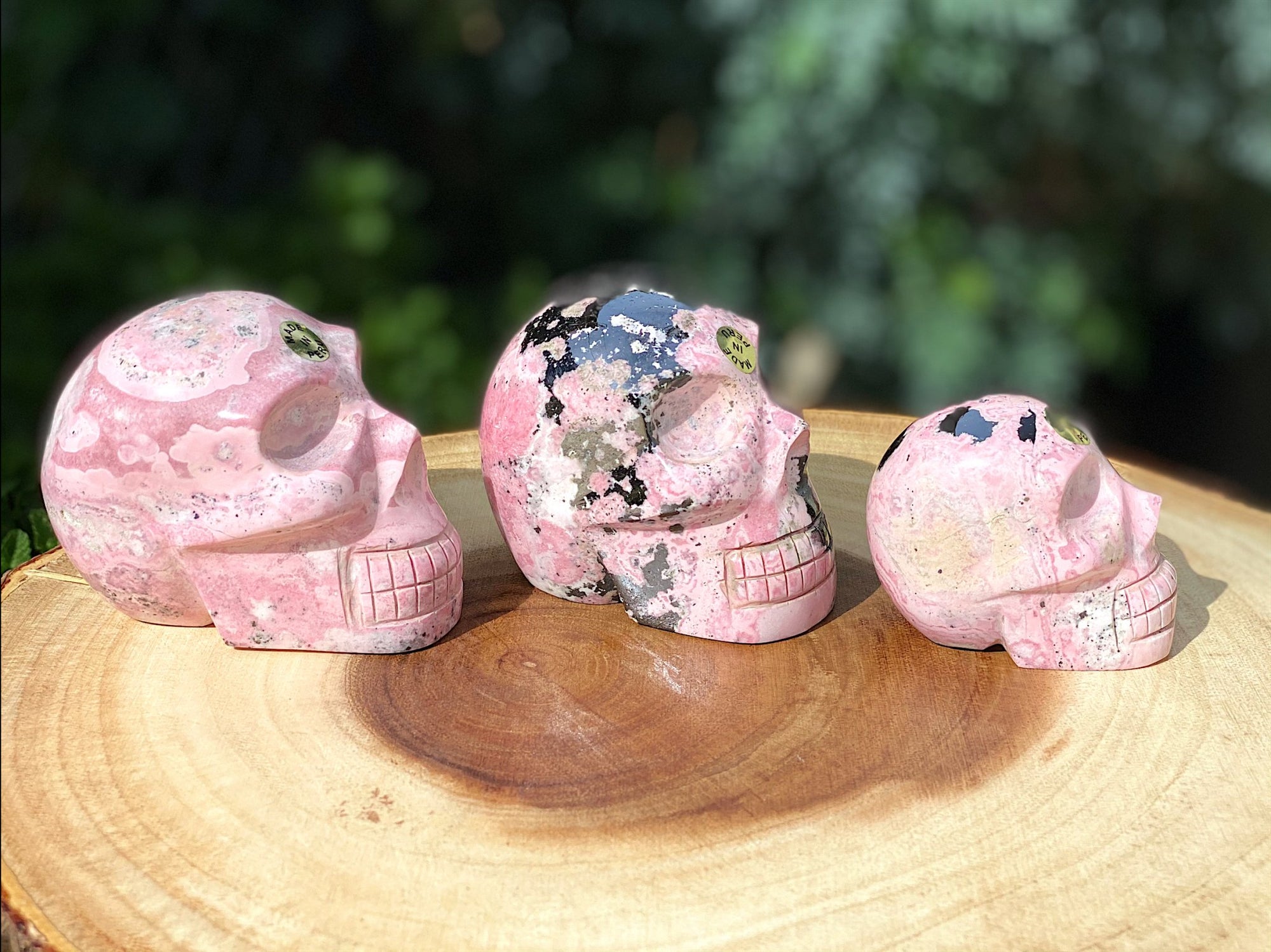 Hand Carved Peruvian Rhodonite Skulls - Shop Cosmic Healing