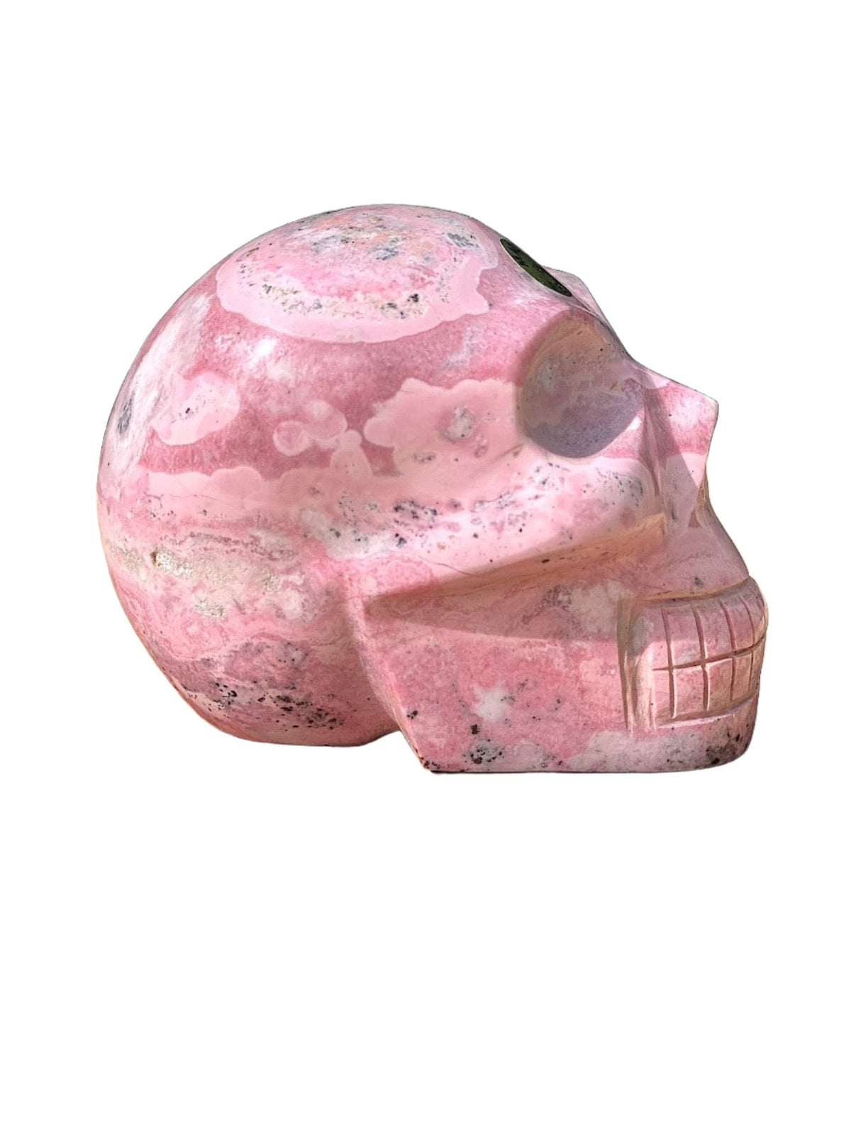 Hand Carved Peruvian Rhodonite Skulls - Shop Cosmic Healing