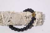 Lava Stone with Gold Hand of Fatima - Shop Cosmic Healing