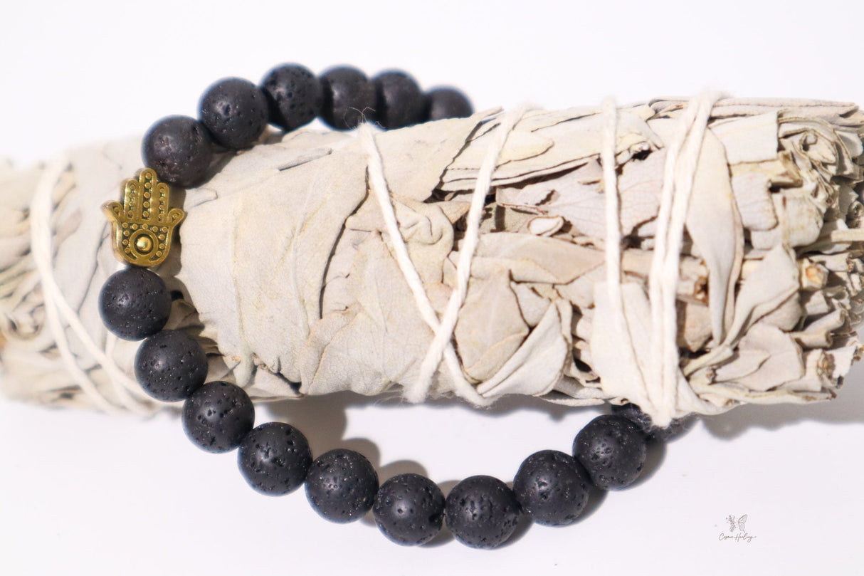 Lava Stone with Gold Hand of Fatima - Shop Cosmic Healing