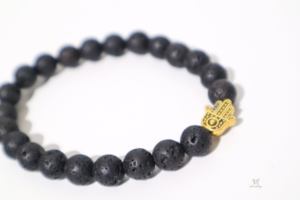 Lava Stone with Gold Hand of Fatima - Shop Cosmic Healing