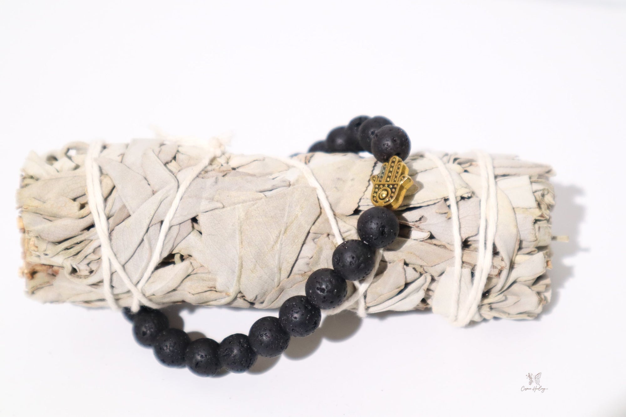 Lava Stone with Gold Hand of Fatima - Shop Cosmic Healing