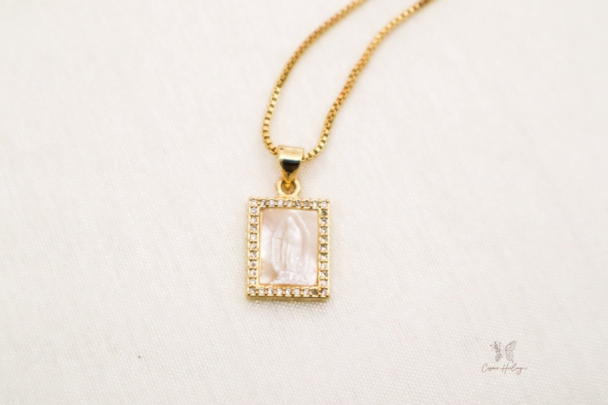 Mother of Pearl necklace featuring a detailed Lady of Guadalupe pendant