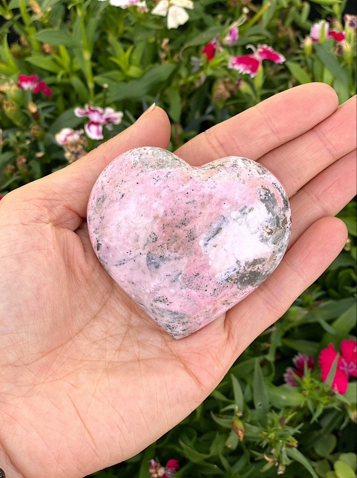 Elegant heart-shaped Rhodonite crystal