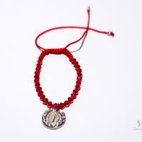 Red cord saint benedict bracelet 